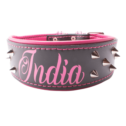 Collar de cuero para perros grandes, pitbull, american bully, rottweiler y similares. Este modelo es específico para perros hembra, de color negro y rosa, lleva unos conos metálicos decorativos.